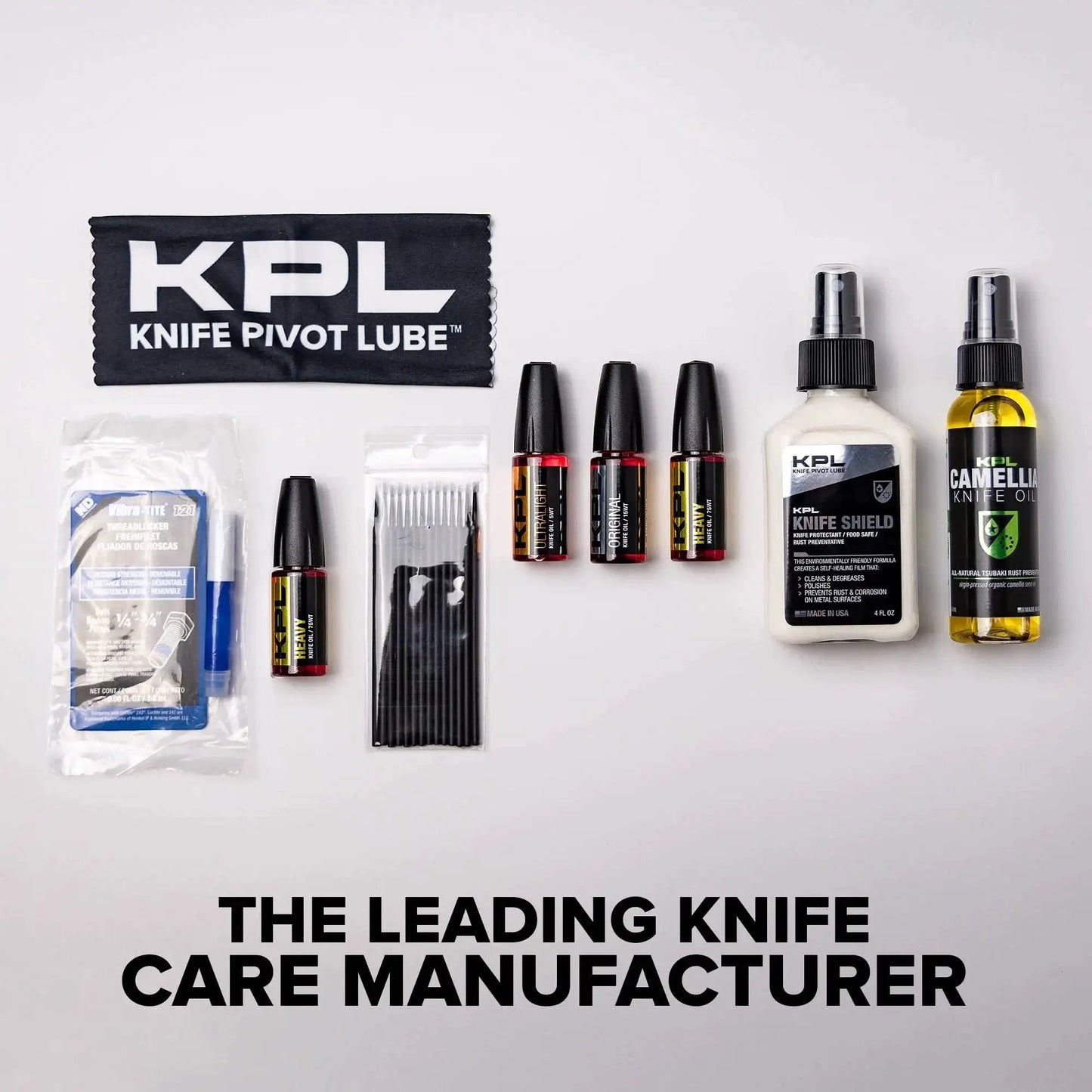Assorted knife care products including heavy duty knife pivot lube, oils, and cleaning supplies displayed on a white background.