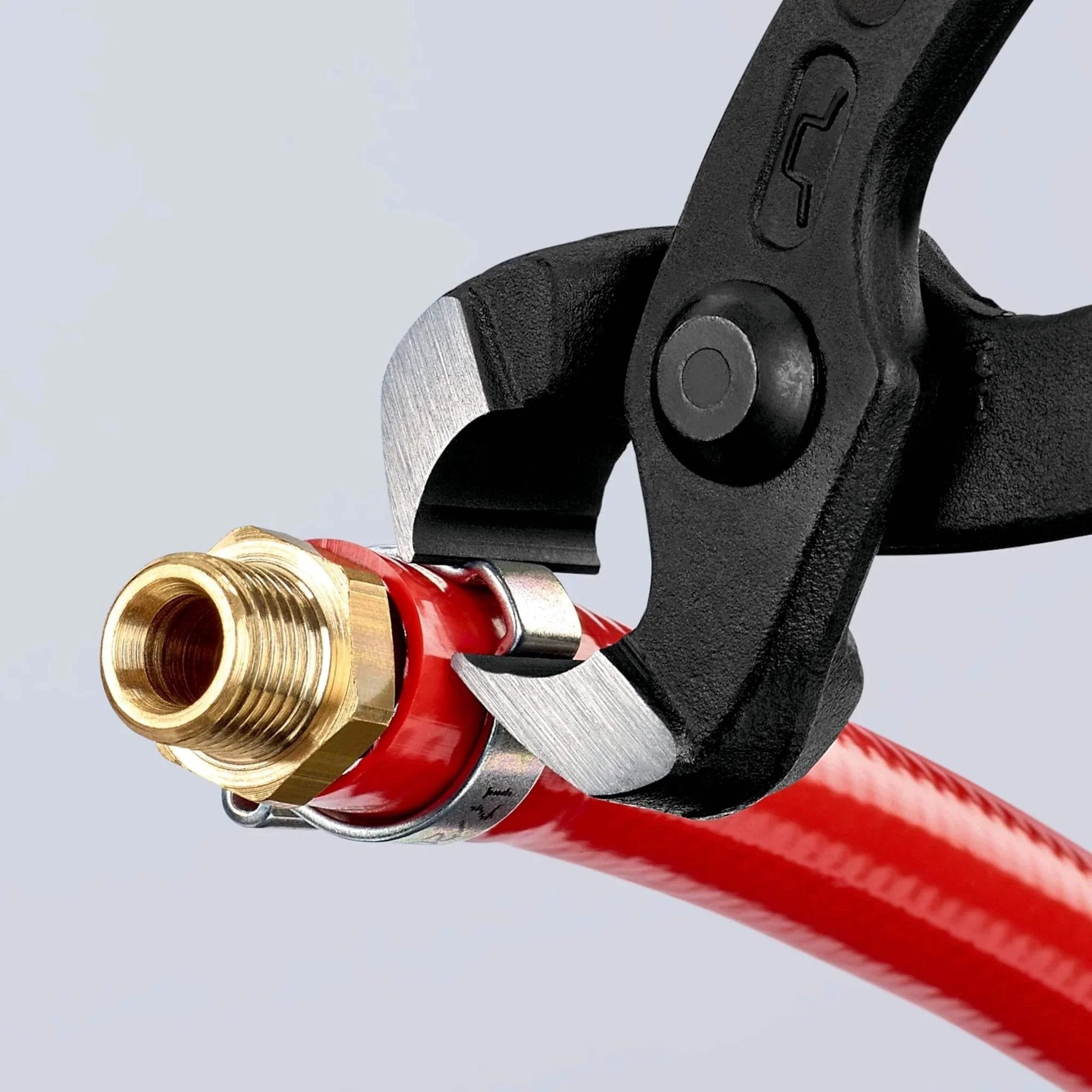 Knipex Tools Eight Point Seven Five Inch Ear Clamp Pliers 1 Ear 2 Ear Clamp Tool 1098i220 for Oetiker Clamps in use on red hose