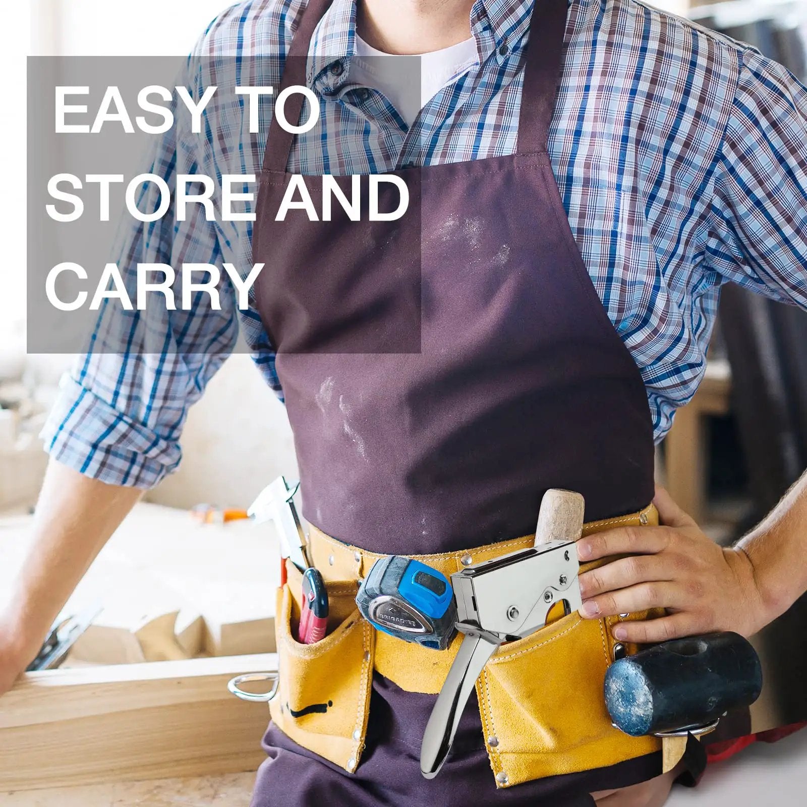 Person wearing apron and tool belt holding Light Duty Staple Gun Kit With 2000 Three Eighths Inch JT21 Staples and other tools.