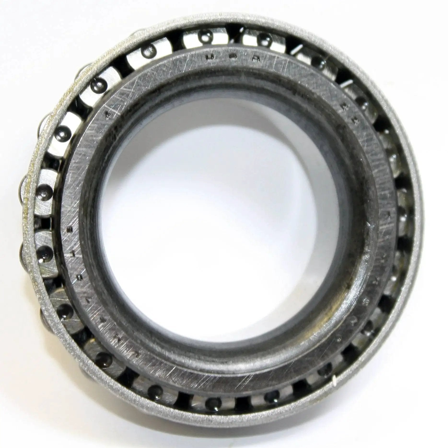 High precision LM67048 bearing delivers ultra low friction and extended life with OE quality for automotive and machinery use