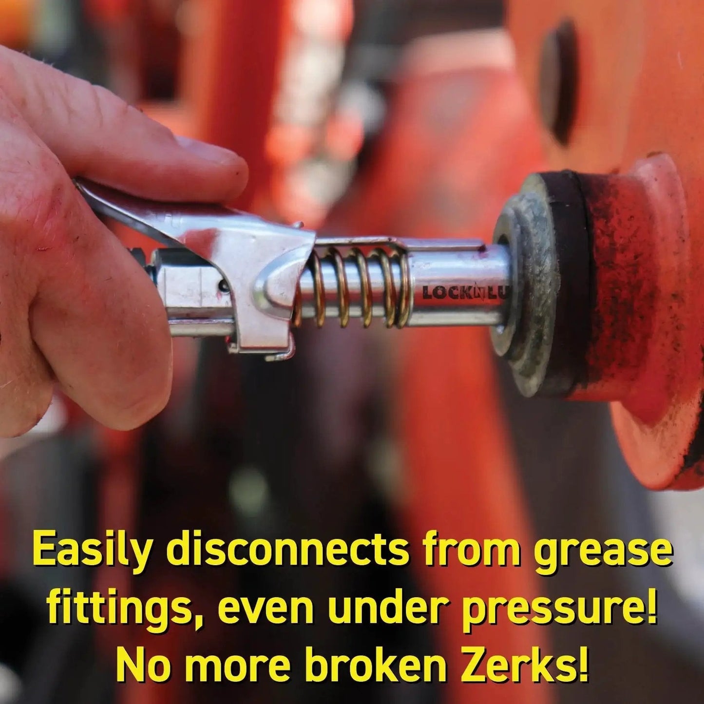 Locking Grease Gun Coupler That Clamps On And Stays Put, Prevents Leaks While You Grease Zerk Fittings, shown in use on machinery