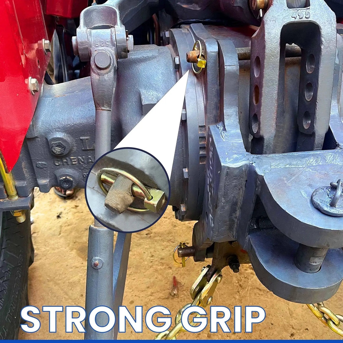 Installed lynch pin securing hitch on tractor, part of Six Piece Lynch Pin Kit With Ring For Trucks Trailers Tractors Lawnmowers Trolleys And More 5/16 By 1-3/4 Inch Stainless Lynch Pins Assortment For Safe Hitch Retention And Wheel Lock Durable Quick Pin Retainers For Heavy Duty Use.