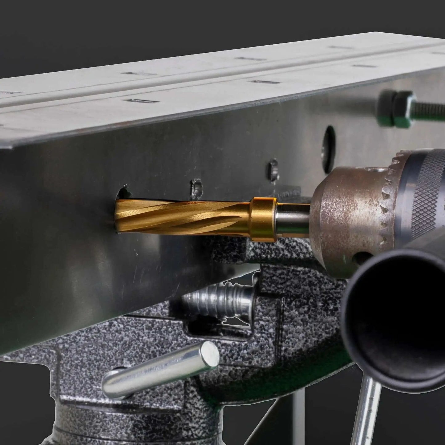 Four Piece Bridge And Construction Reamer Set With M2 HSS Taper Chucking Reamers For Steel Aluminum Wood And Plastic To Enlarge And Align Holes With Three Eighths Inch Or One Half Inch Shanks installed on metal surface
