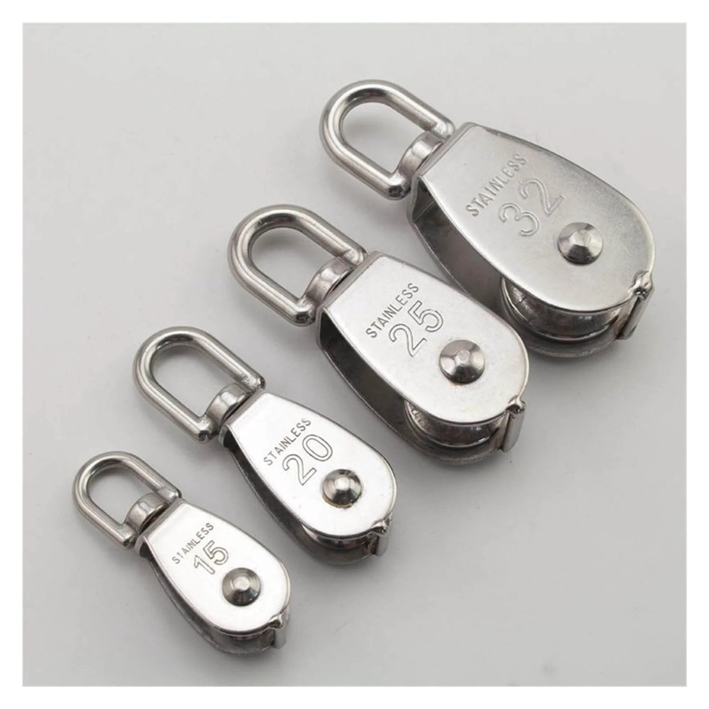 Assorted stainless steel pulleys with one labeled 32, showcasing various sizes for lifting tasks. Stainless Steel Pulley M32 Single Wheel Swivel Lifting Rope Pulley Set Lifting Wheel Tools(M32) visible.