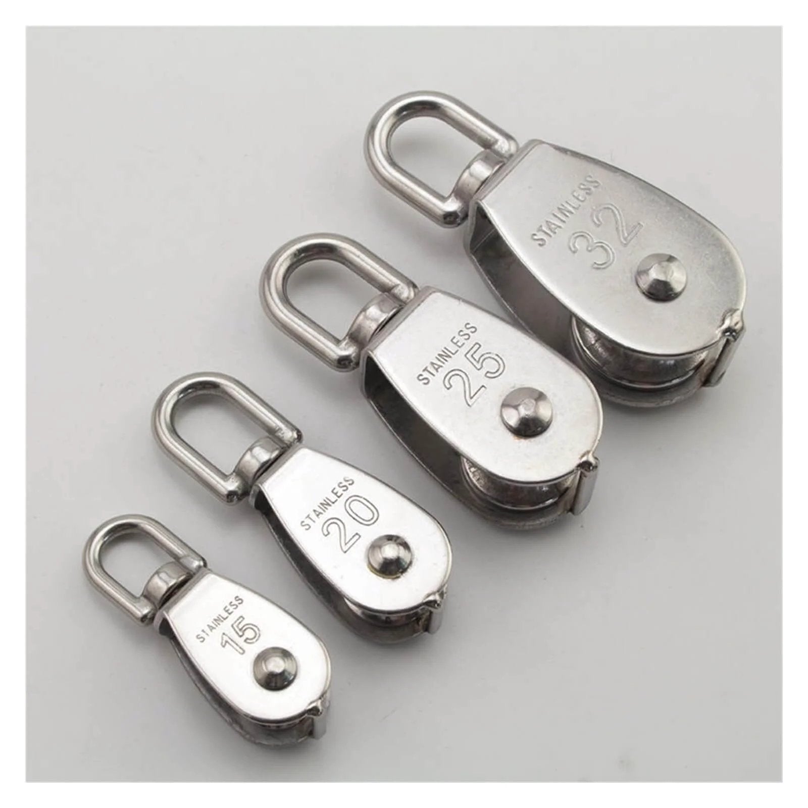 Assorted stainless steel pulleys with one labeled 32, showcasing various sizes for lifting tasks. Stainless Steel Pulley M32 Single Wheel Swivel Lifting Rope Pulley Set Lifting Wheel Tools(M32) visible.