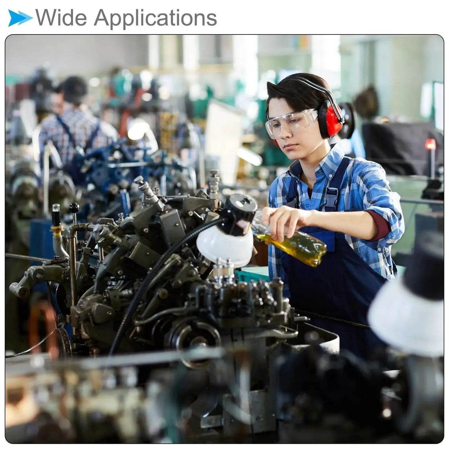 Worker using Push Button Grease Oil Cup for lubrication on machinery in a heavy-duty shop setting.