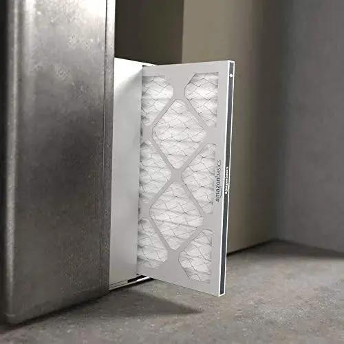 Six pack MERV 8 furnace air filters fit standard 16x20x1 slots, trapping dust, pollen and lint to improve indoor air quality; installed view
