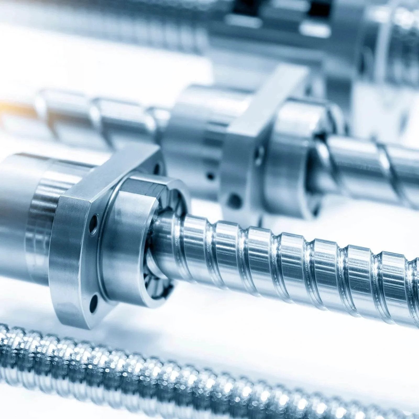 Close-up of metallic machine components, not directly showing 2pcs Sleeve Bearings 3/4" Bore 1" OD 2" Length Cast Brass Self-Lubricating Bushing.