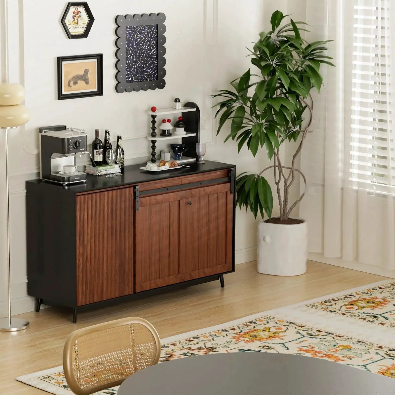 Stylish kitchen sideboard set in a modern room with a potted plant and wall art