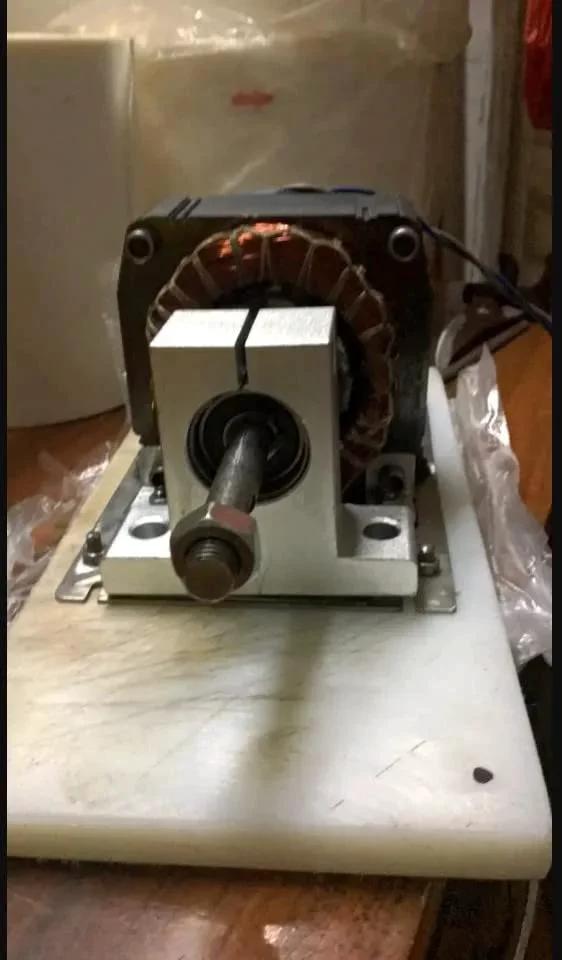 Oilless Bushing Sleeve Bearing 1.25 Inch Bore 1.40 Inch OD 1.17 Inch Length installed in machine