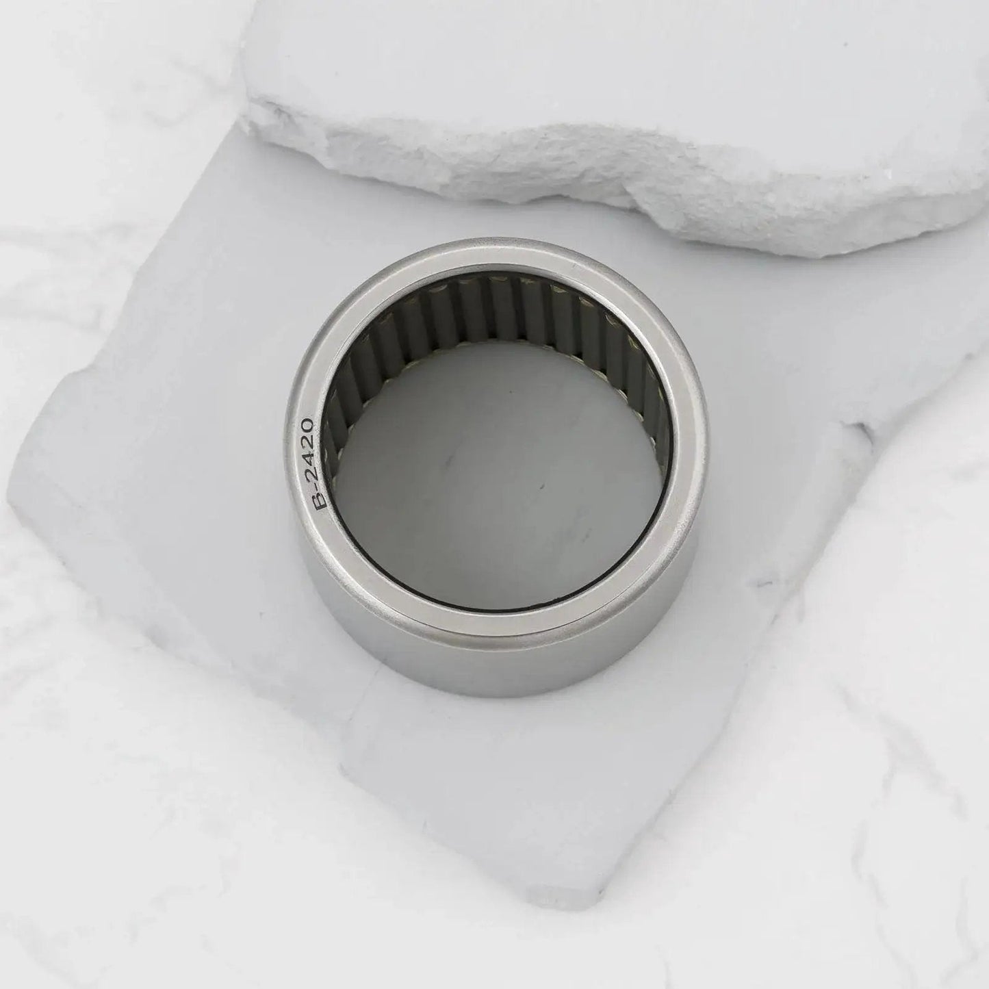 Needle Roller Bearing B-2420 Set Of 2 With Bore 38.1mm Outer Diameter 47.625mm bearing on stone surface
