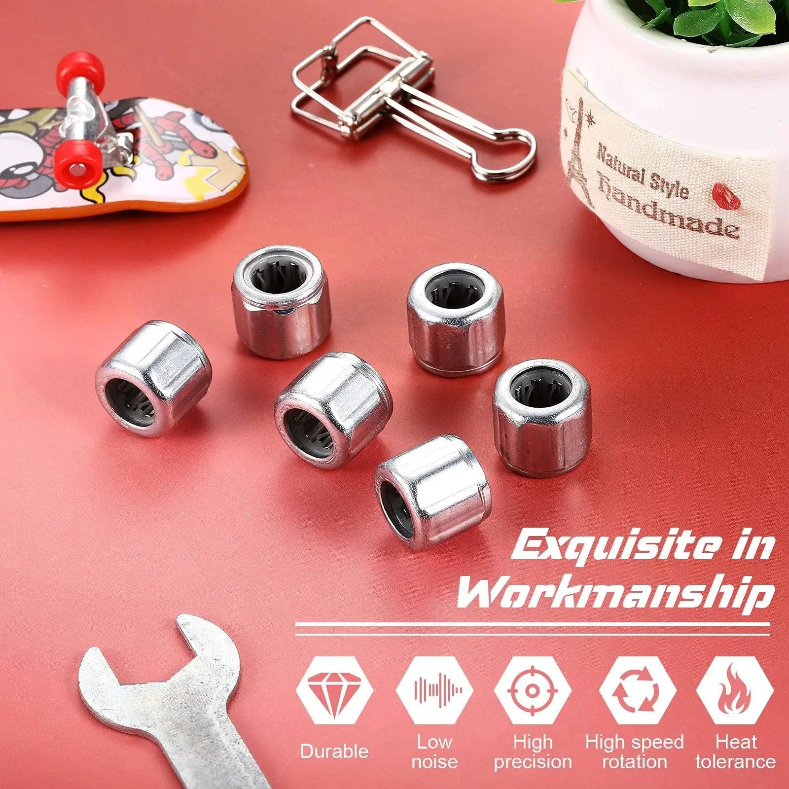 Six Pieces Heavy Duty Needle Roller Bearings 8mm Bore 14mm OD 12mm Width on red surface with wrench and small decorations