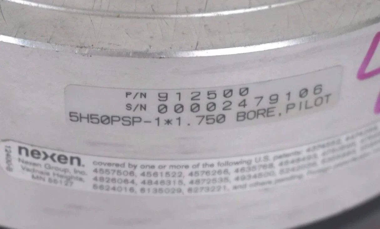 Close-up of Nexen 912500 5H50PSP Single Position Tooth Clutch label showing part number and specifications.