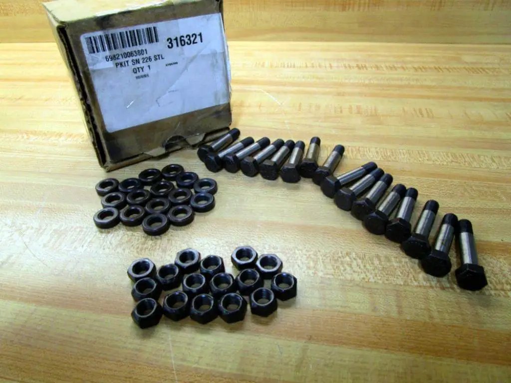 NPT Pipe Fitting Kit With 5/16-18 Fine Thread 316321 Stainless Steel PKIT SN 226 STL on workbench with box