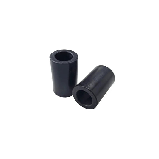 Replacement Axle Pivot Tube Spacer Bushing Nylatron For Husqvarna 532136518 And Craftsman 136518, two black plastic bushings on white background.