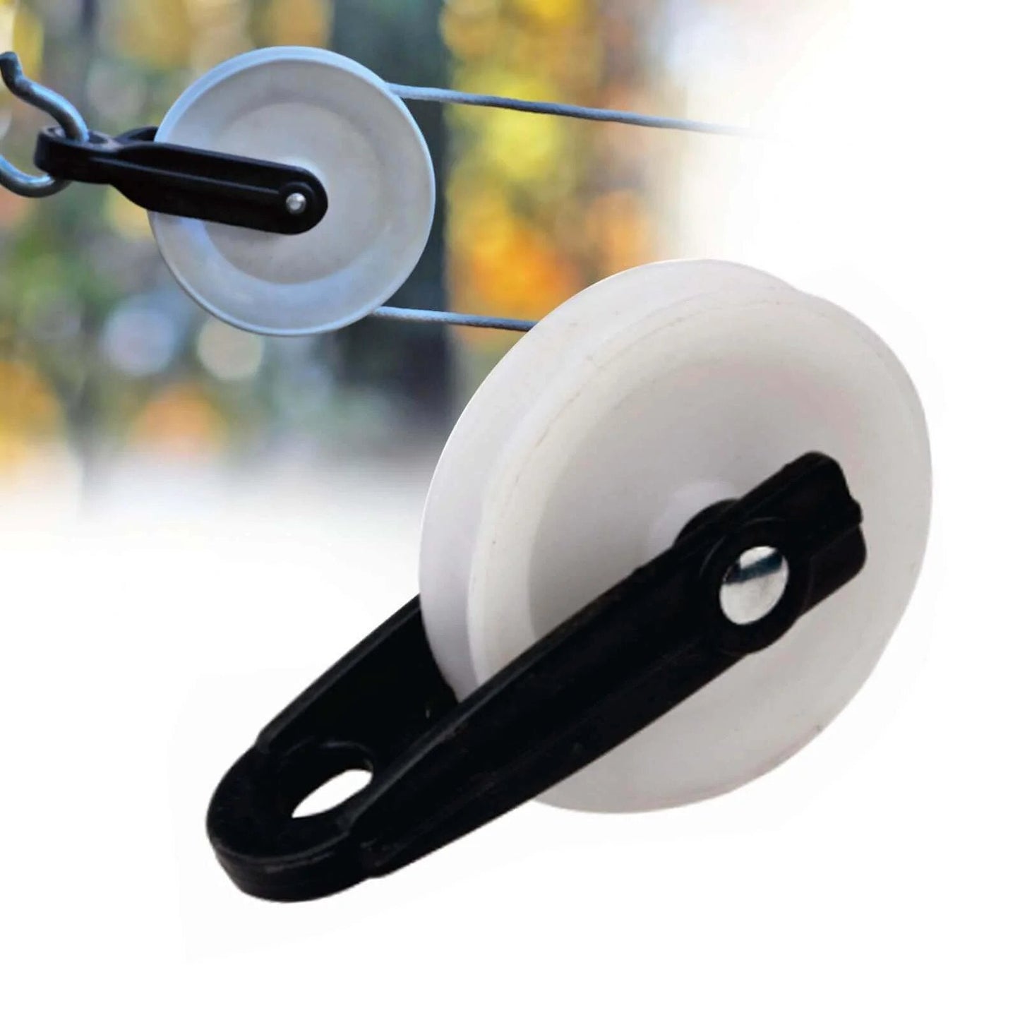Close-up of 2 PCS Nylon Clothesline Pulley, 2-1/2-inch Diameter Nylon Pulley with outdoor installation