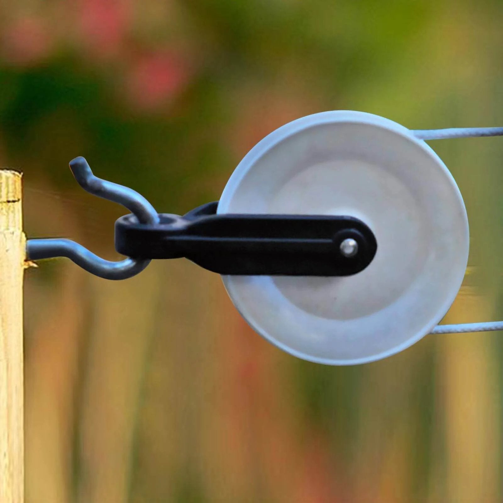 Outdoor pulley in use, attached to post, for 2 PCS Nylon Clothesline Pulley,2-1/2-inch Diameter Nylon Pulley,Clothes Puller Line Pulley Kit