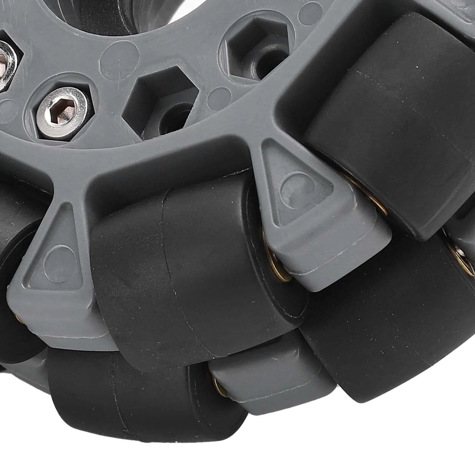 Close-up of Omni Wheel for Robot 100mm 360 Degree Omnidirectional Plastic Wheel showing rubber rollers and brass bearings.