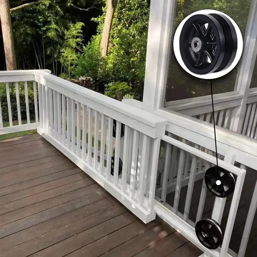 V Groove Cast Iron Wheel 4 By 1.5 Inches With 600 Pound Load Capacity installed on sliding gate track, black wheel