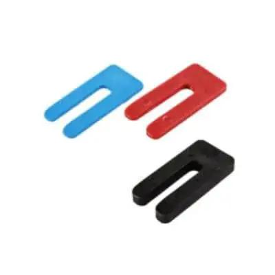 Plastic U Shims Variety Pack Blue One Sixteenth Inch Red One Eighth Inch Black One Quarter Inch Shims grouped by color.