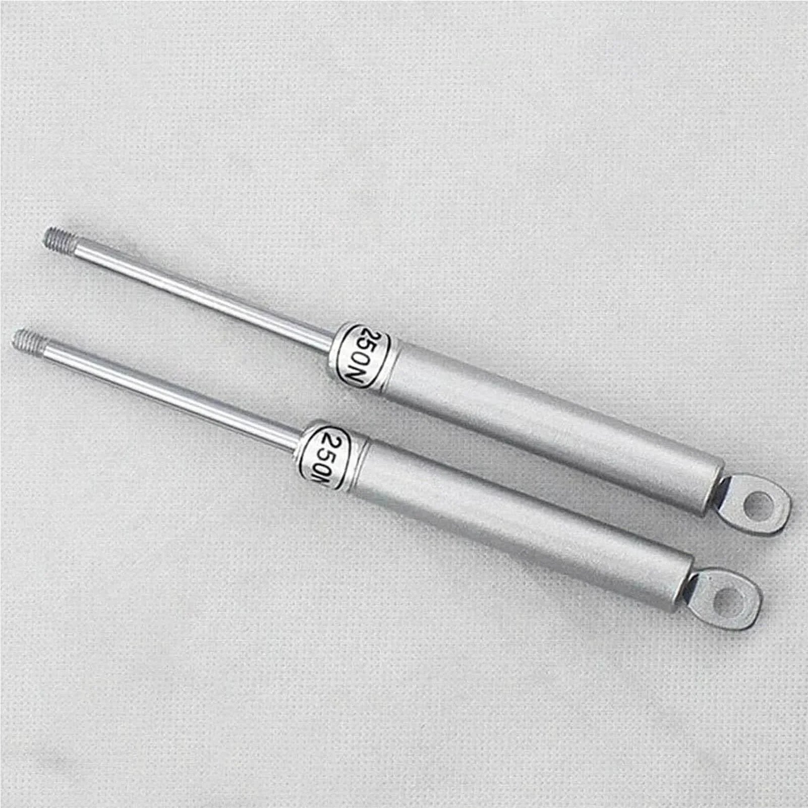 Vertical Swing Lift Up Stay Pneumatic for Cabinet Door hardware, silver finish; two durable pneumatic arms on display.