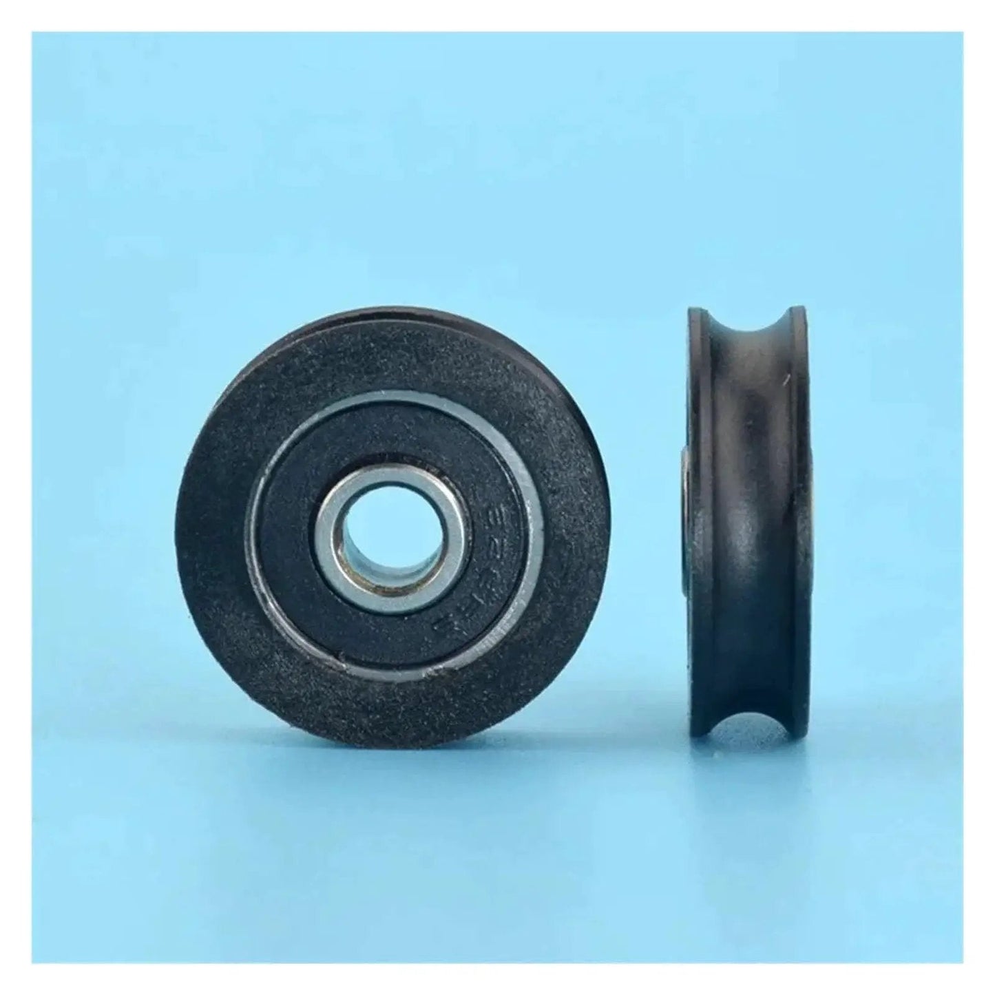 Front and side view of Nylon 6x26x7mm POM Moving Pulley With 626RS Bearing For Doors And Cabinets, compact durable wheel.