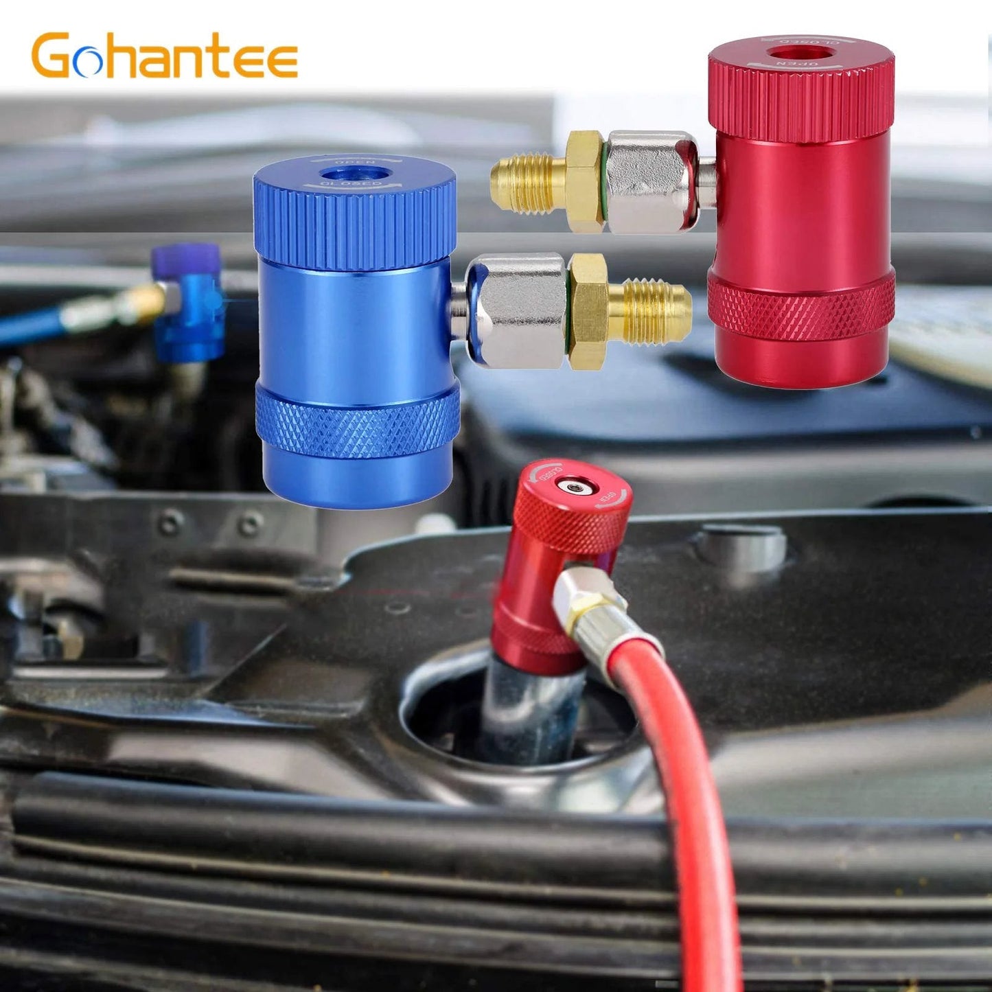 R1234yf Quick Coupler Adapters For High And Low Side Manual Disconnects, One Quarter Inch Fittings, Refrigerant Manifold Gauge Set Compatibility, Easy Install, Heavy Duty AC Charging And Diagnostic Tools For Automotive Refrigerant Service. Two couplers, one blue, one red, with hose attachment in automotive engine.
