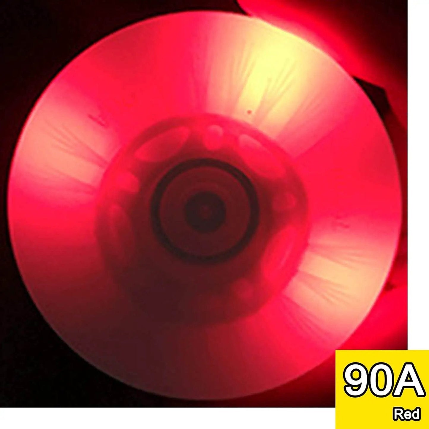 Red luminescent inline skate wheel glowing in the dark, 90A hardness, close-up view showing preinstalled ABEC 9 bearing.