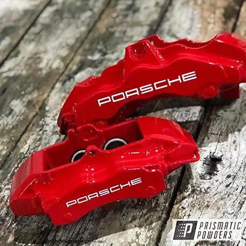 Astatic Red Solid Tone Polyester Powder Coating 1 LB High Gloss Finish For Automotive Metal Wheels And Parts Durable High Performance Coating Proudly Made In The USA 85 Plus Gloss Units on red Porsche brake calipers.