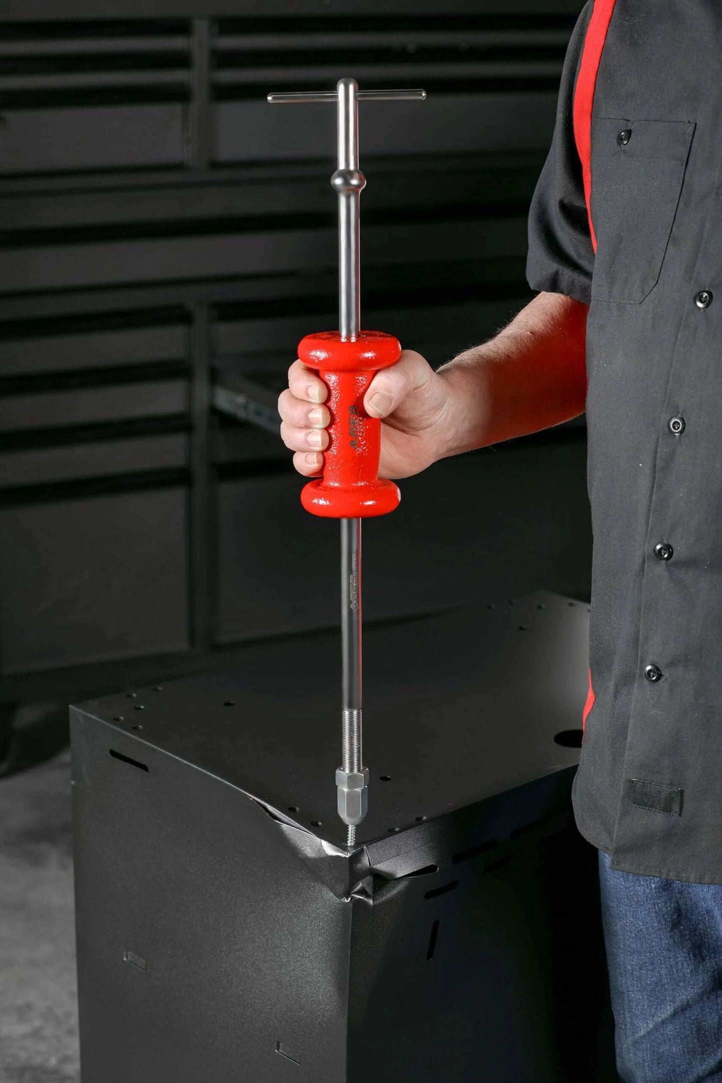 Man using Master Slide Hammer Puller Set - 10-Way Slide Hammer Puller Set Includes 3-Piece Rear Axle Bearing Puller Kit