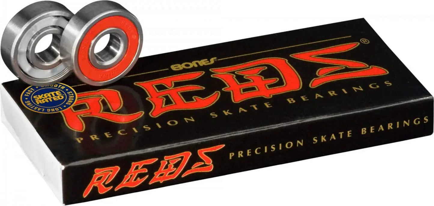 Bones REDS Skateboard Bearings 8 Pack High Performance Precision Bearings with packaging and two bearings displayed