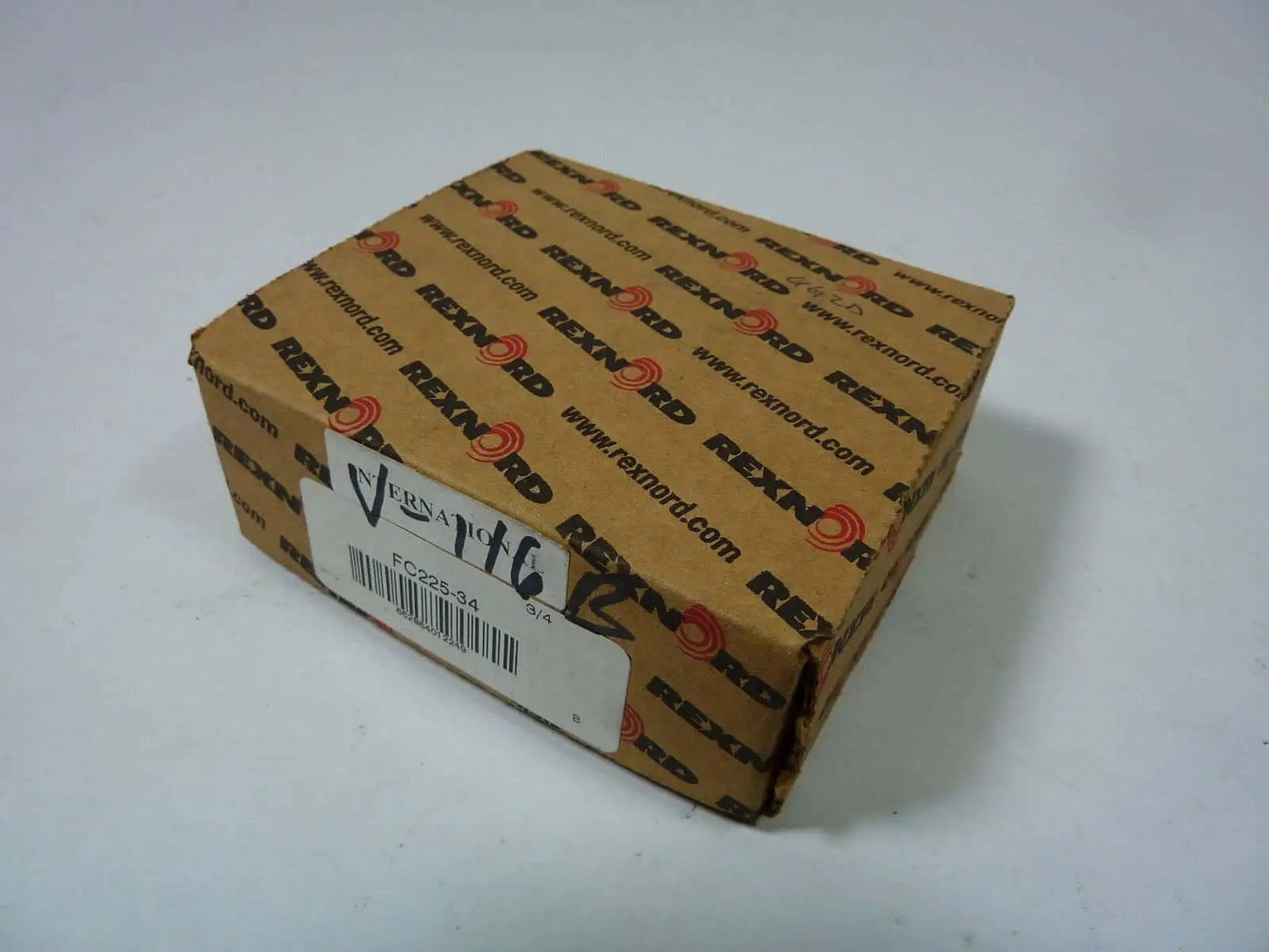 Beefy Heavy Duty Ball Bearing With Two Bolt Flange And Three Quarter Inch Shaft Rexnord FC225 34 Model in packaging