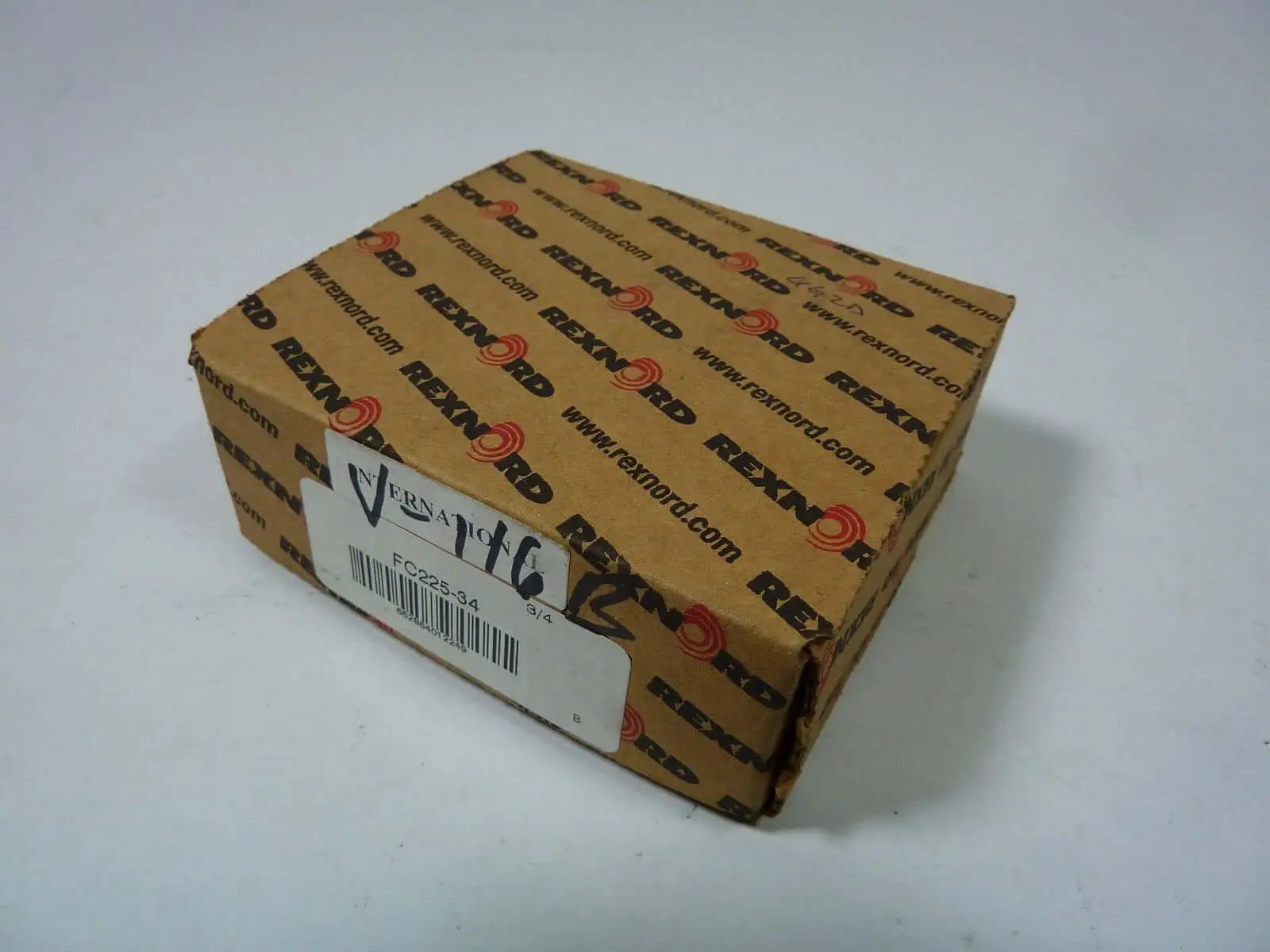 Beefy Heavy Duty Ball Bearing With Two Bolt Flange And Three Quarter Inch Shaft Rexnord FC225 34 Model in packaging