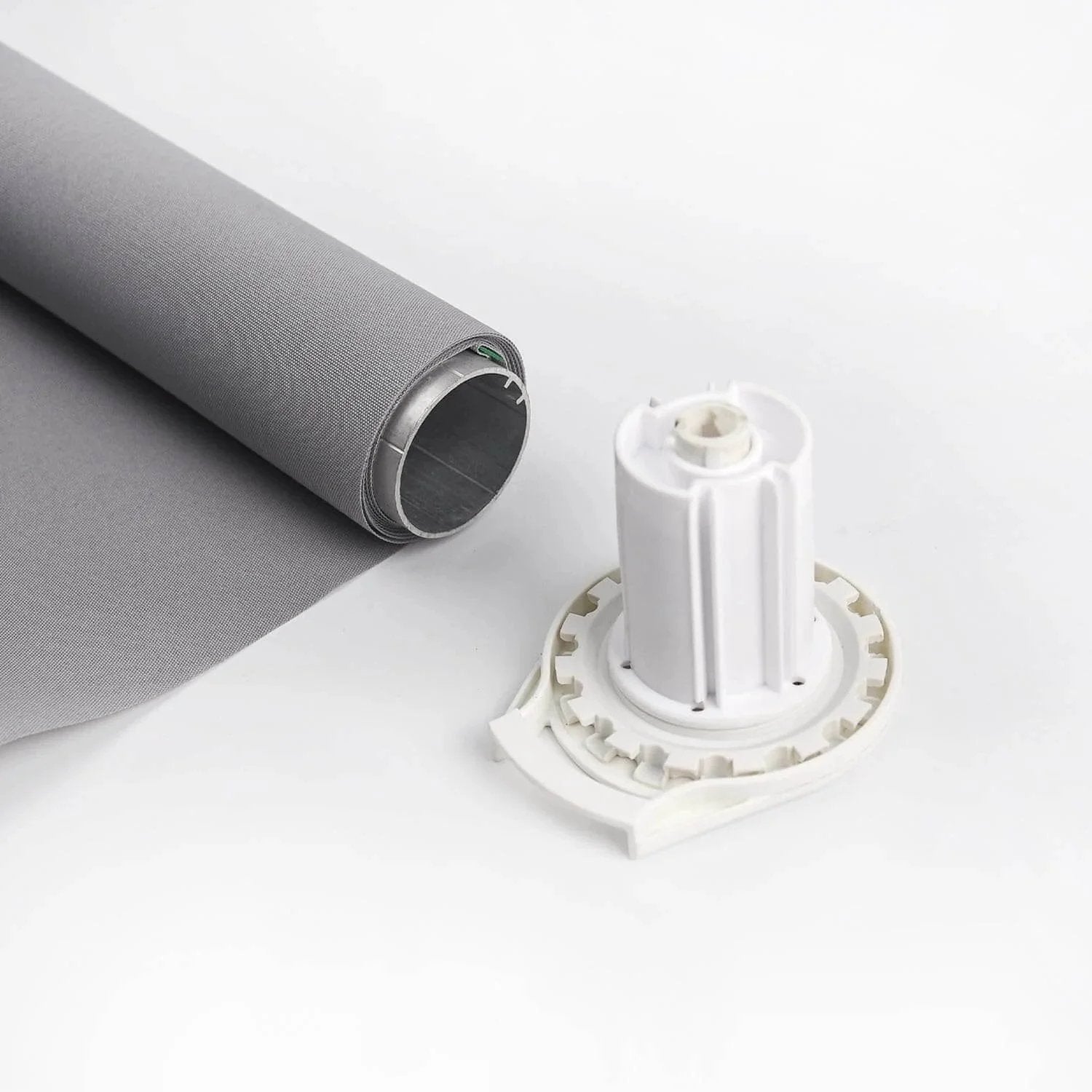 R16 Roller Shade Clutch for 1.5" Tube Roller Shade Brackets & Hardware shown with grey rolled fabric and white clutch