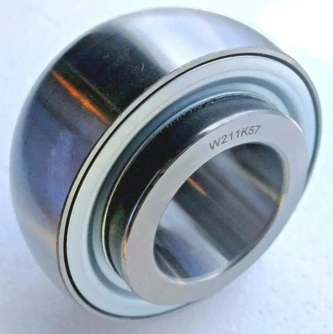 W211K57 Agricultural Disc Harrow Bearing bore 1-3/4″ inch, close-up view of the bearing with silver and black finish.