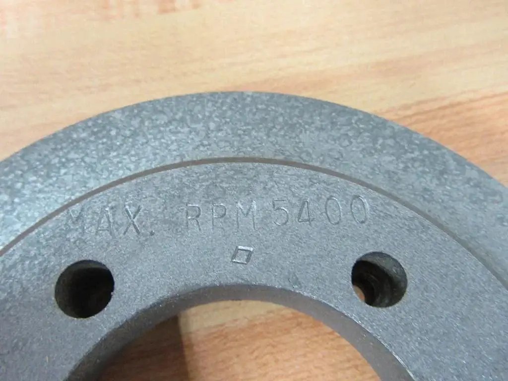 Close-up of compact SDS pulley with 5 inch outer diameter and 2-1/8 inch bore, marked Max RPM 5400 on metal surface.