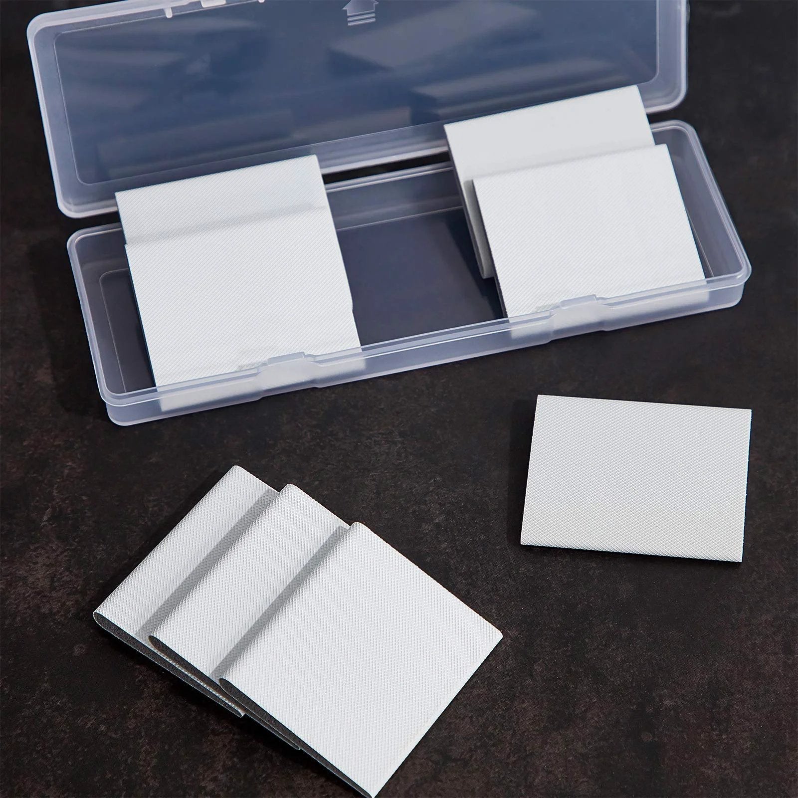 Self Adhesive Door Corner Seals For Weather Stripping And Draft Blocking White 8 Pack Fits Most Doors Easy Peel And Stick Sealing Foam in storage box.