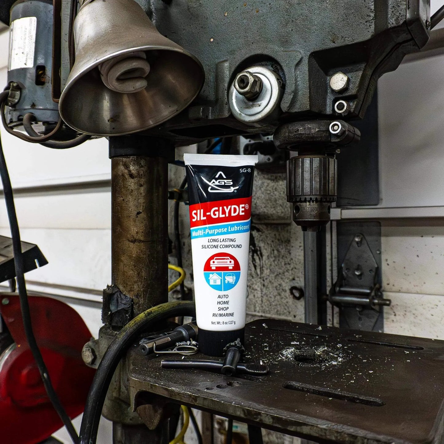 SIL-Glyde Multi-Purpose All-Weather Lubricating Compound for All Surfaces - 8 oz Tube on industrial machine