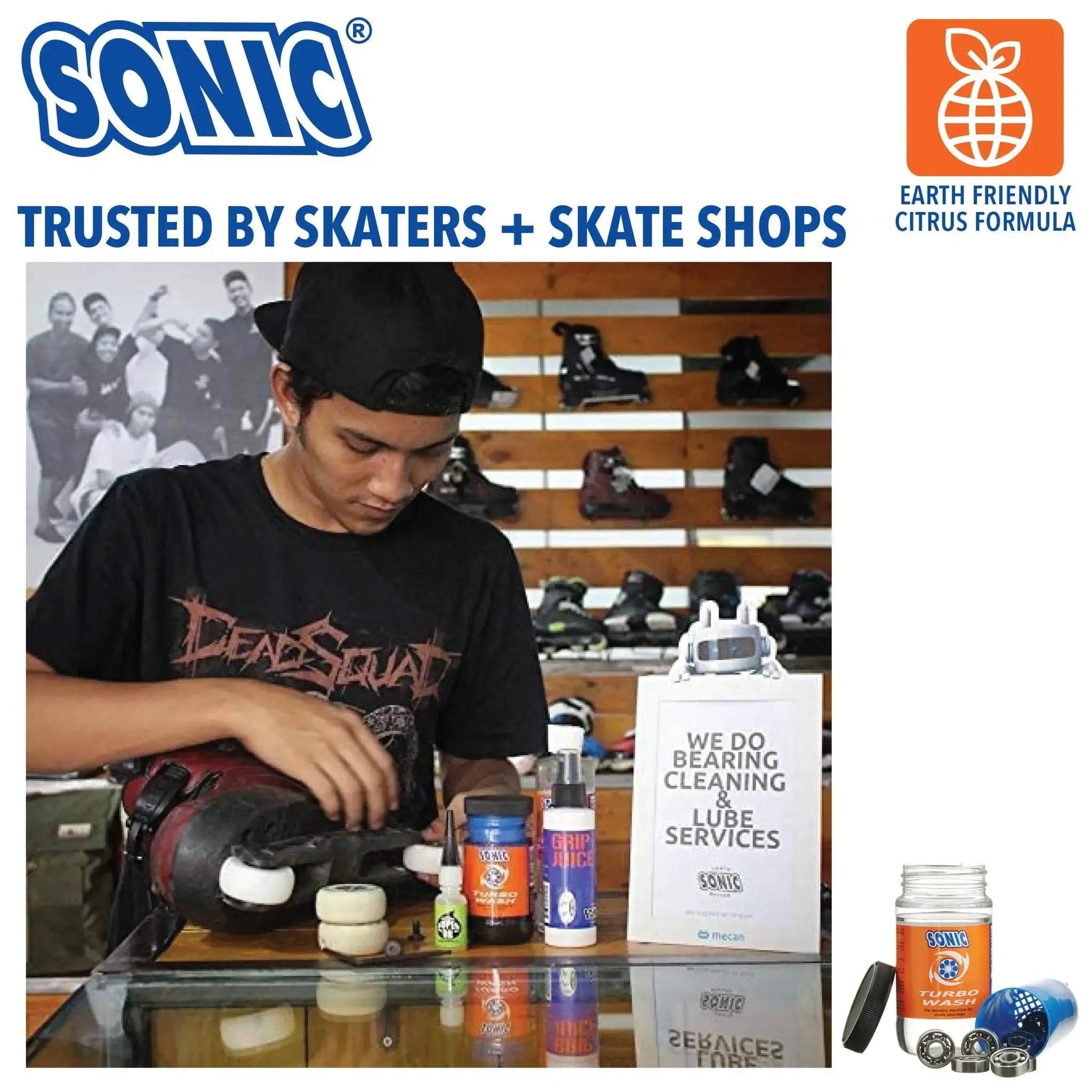 Person using Complete Pro Grade Skate Bearing Cleaning Kit with 8 oz Citrus Cleaner in skate shop with inline skates.