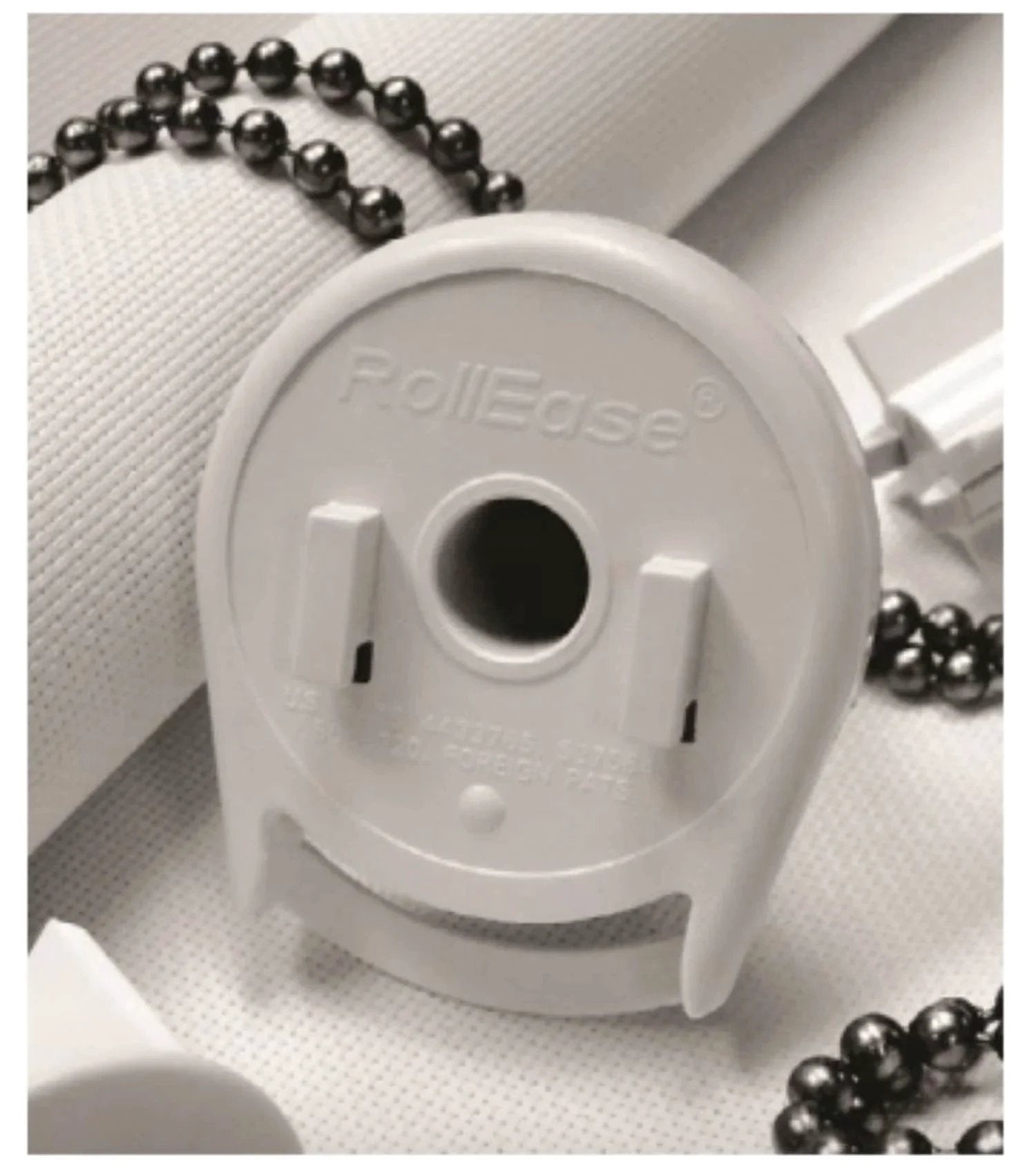 Skyline SL15 Roller Shade Clutch #SL15H01W / 1-1/8" Tube White, close-up of the clutch with bead chain visible.