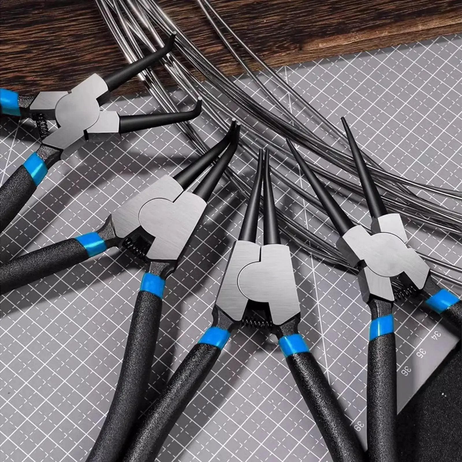 Four 5-inch snap ring pliers from the 850 Piece C Clip And Snap Ring Assortment Kit In 304 Stainless Steel for mechanical maintenance.