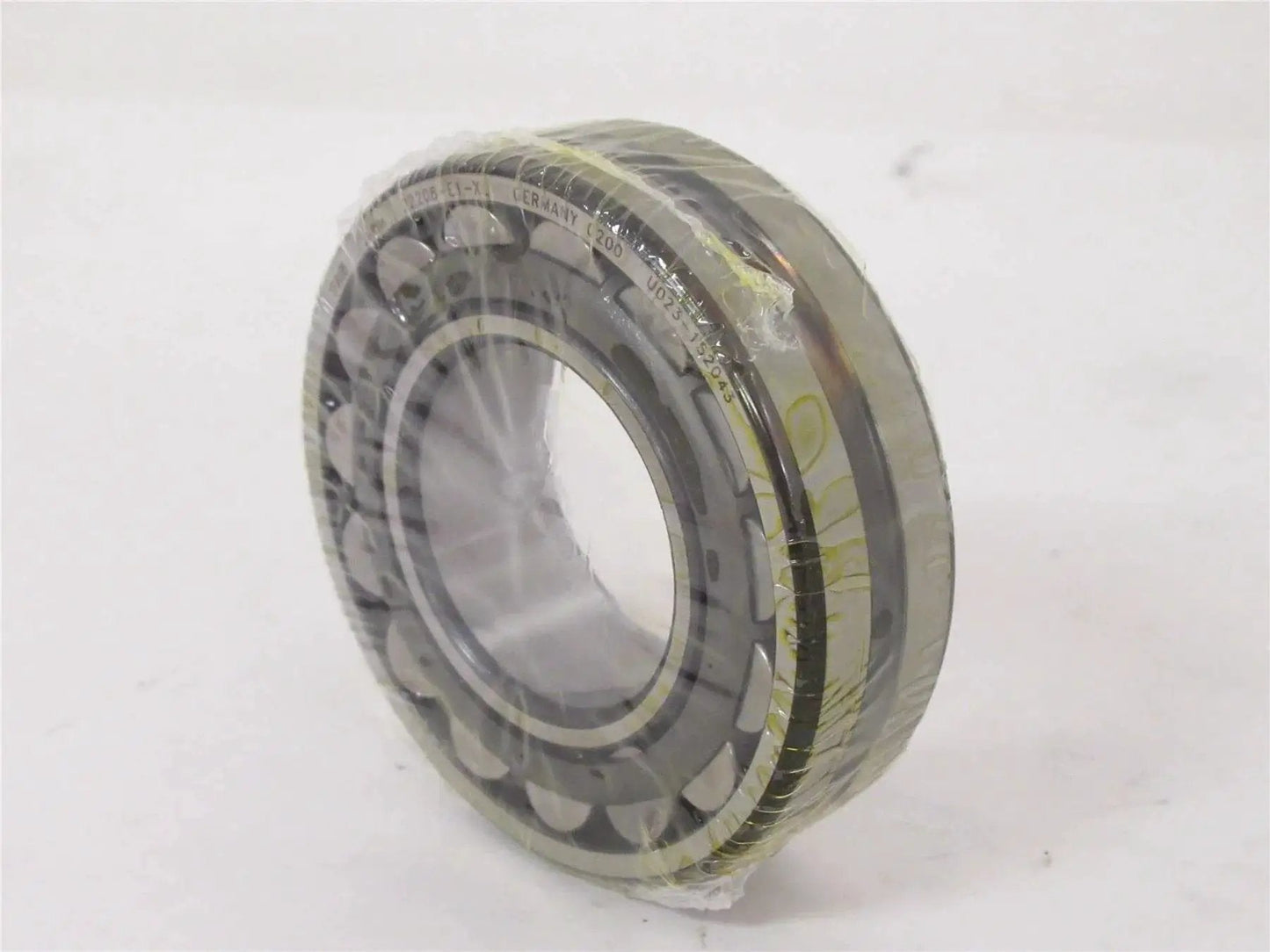 High precision spherical roller bearing 22208 E1 XL 40x80mm with sealed design, ideal for industrial machinery use, side angle view