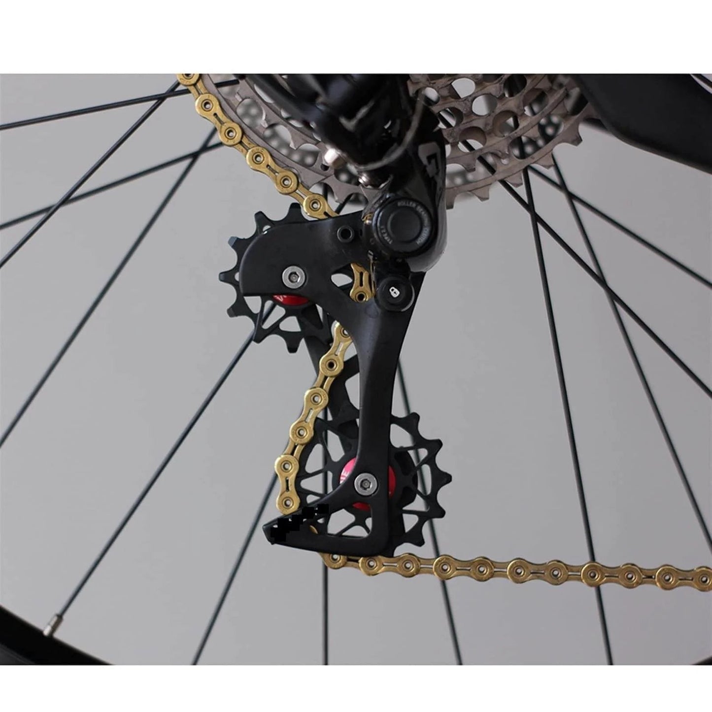 Close-up of pulley bearing road mountain bike rear derailleur with stainless steel dual bearings, color: 10 black solid.