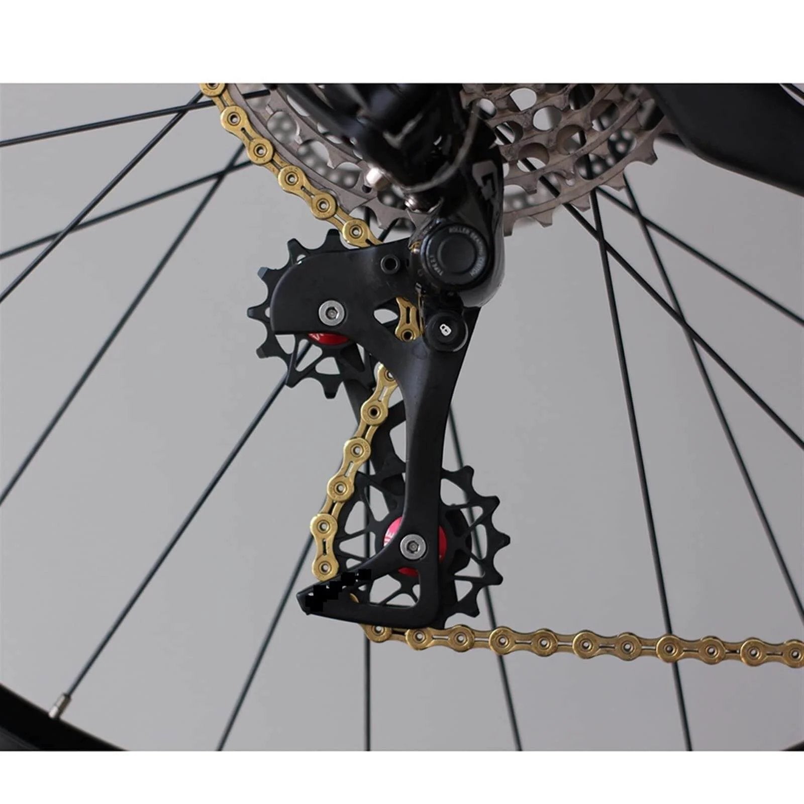 Close-up of pulley bearing road mountain bike rear derailleur with stainless steel dual bearings, color: 10 black solid.