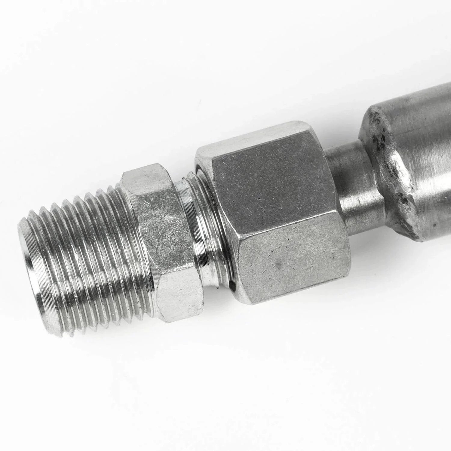Close-up of 1/2 inch NPT adapter on Half Inch By Thirty Six Inch Stainless Steel Flexible Compressed Air Hose with corrosion resistance fittings.