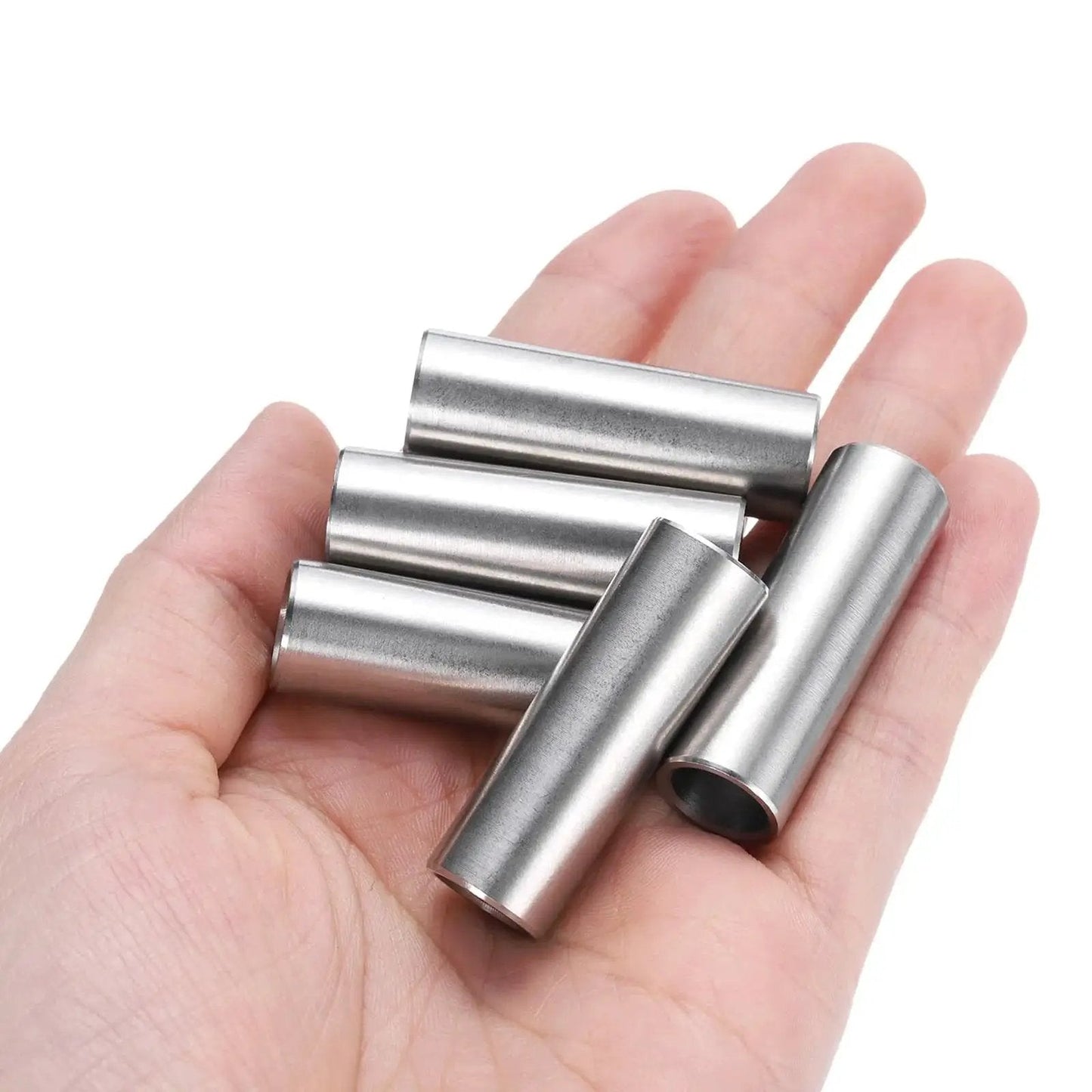 Hand holding five Heavy Duty Stainless Steel Spacer Set 3/8 Bore 1/2 OD 1-1/2 Inch Length For 3/8 Screws Bolts And Rods 304