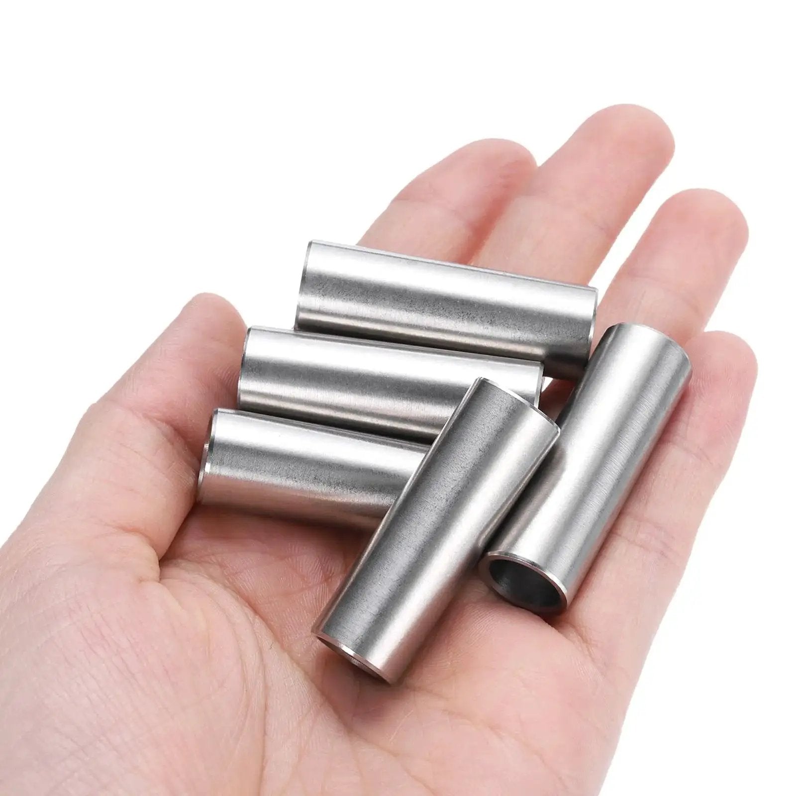 Hand holding five Heavy Duty Stainless Steel Spacer Set 3/8 Bore 1/2 OD 1-1/2 Inch Length For 3/8 Screws Bolts And Rods 304