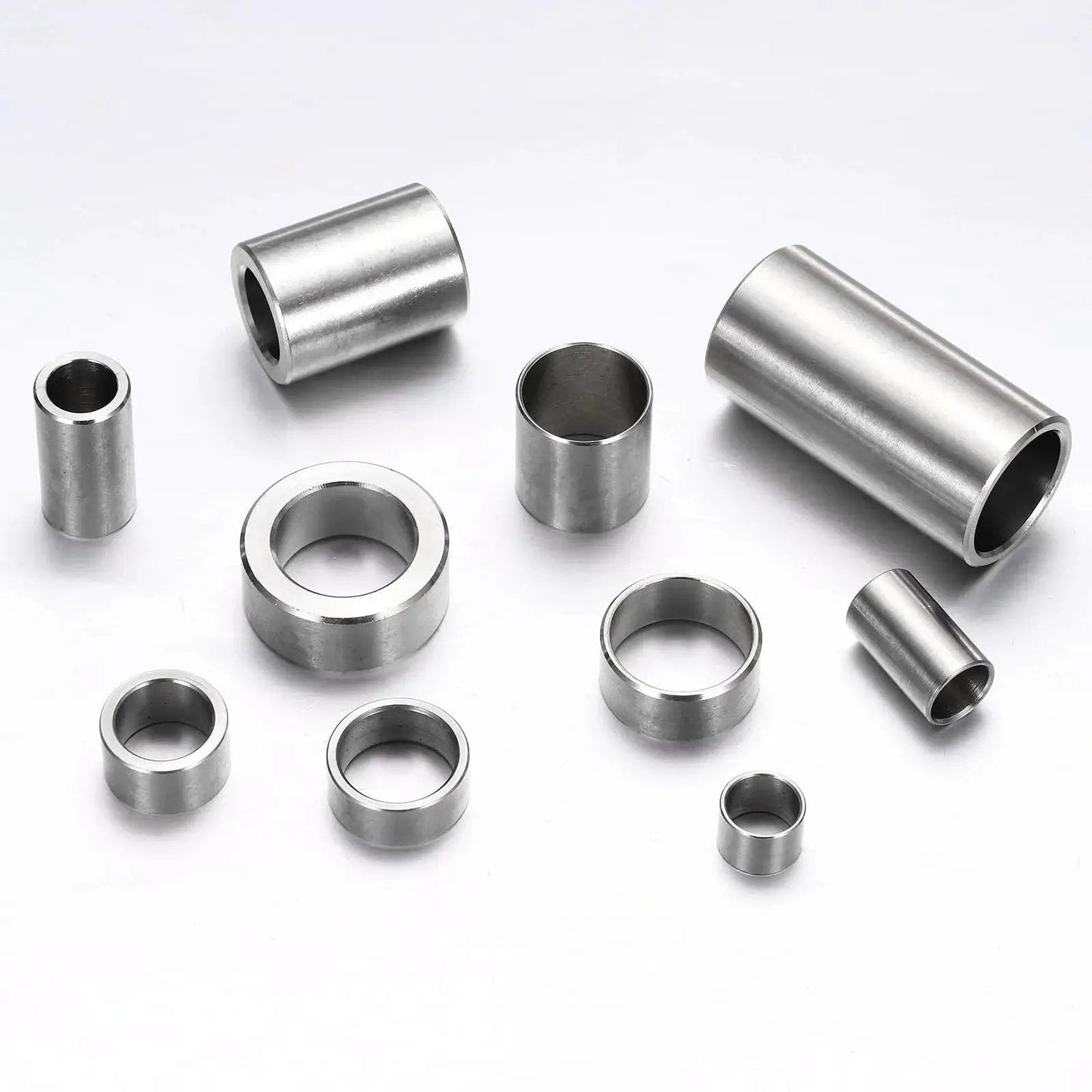 Six Piece M10 Stainless Steel Spacers Set Unthreaded Standoff Bushings For Screws Bolts 10x16x30mm displayed on white surface