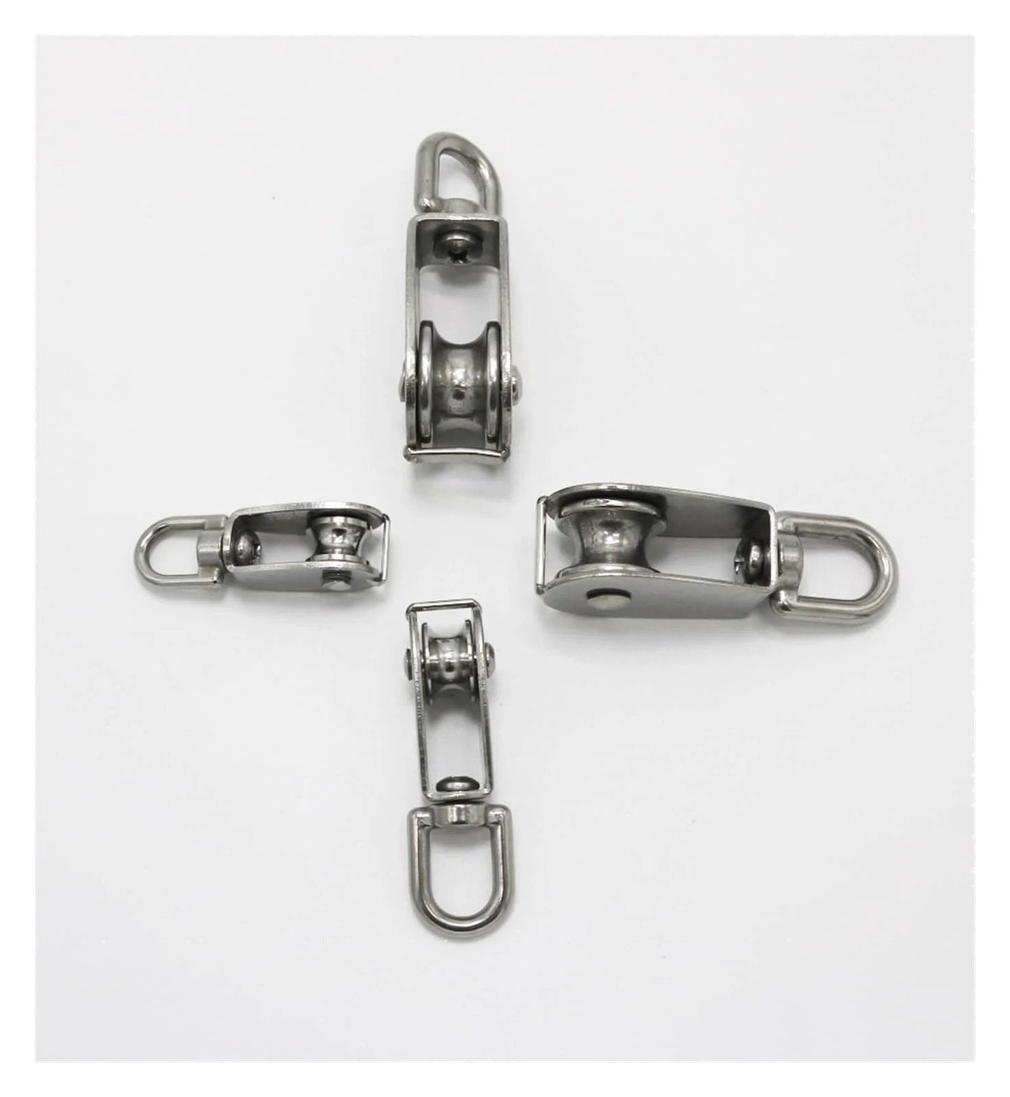 Four Single Swivel Lifting 0.3" Rope Pulley Roller Block Sheave 0.03 Ton(M20 Double) made of stainless steel on white background.