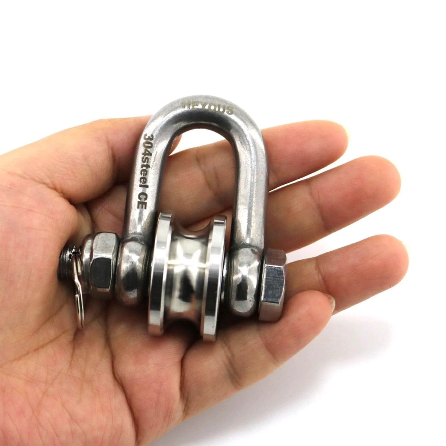Hand holding Long Unbuckled U Shaped Swivelling Pulley Stainless Steel Duplex Bearing Silver Pulley Roller Track Fixed Pulley Suitable for Small Cranes and Salvage Systems and Pulley Model.